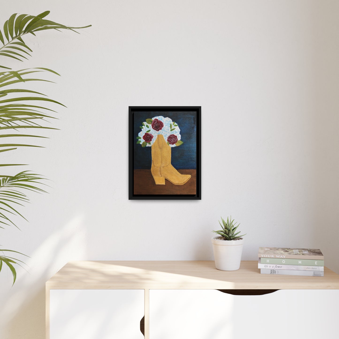 "Boot Bouquet" by Yvonne Blacker printed on matte canvas with black frame