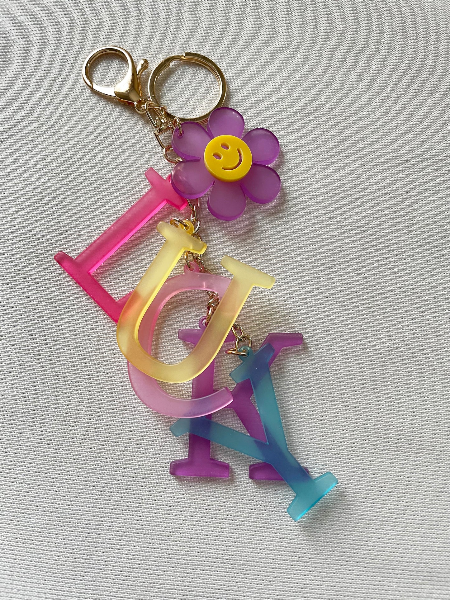LUCKY Laser Cut Keychain with Smilely Face Flower